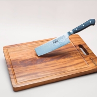 Cleaver and wooden chopping board