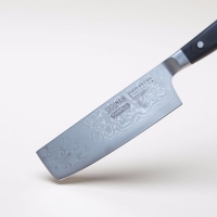 Cleaver and wooden chopping board